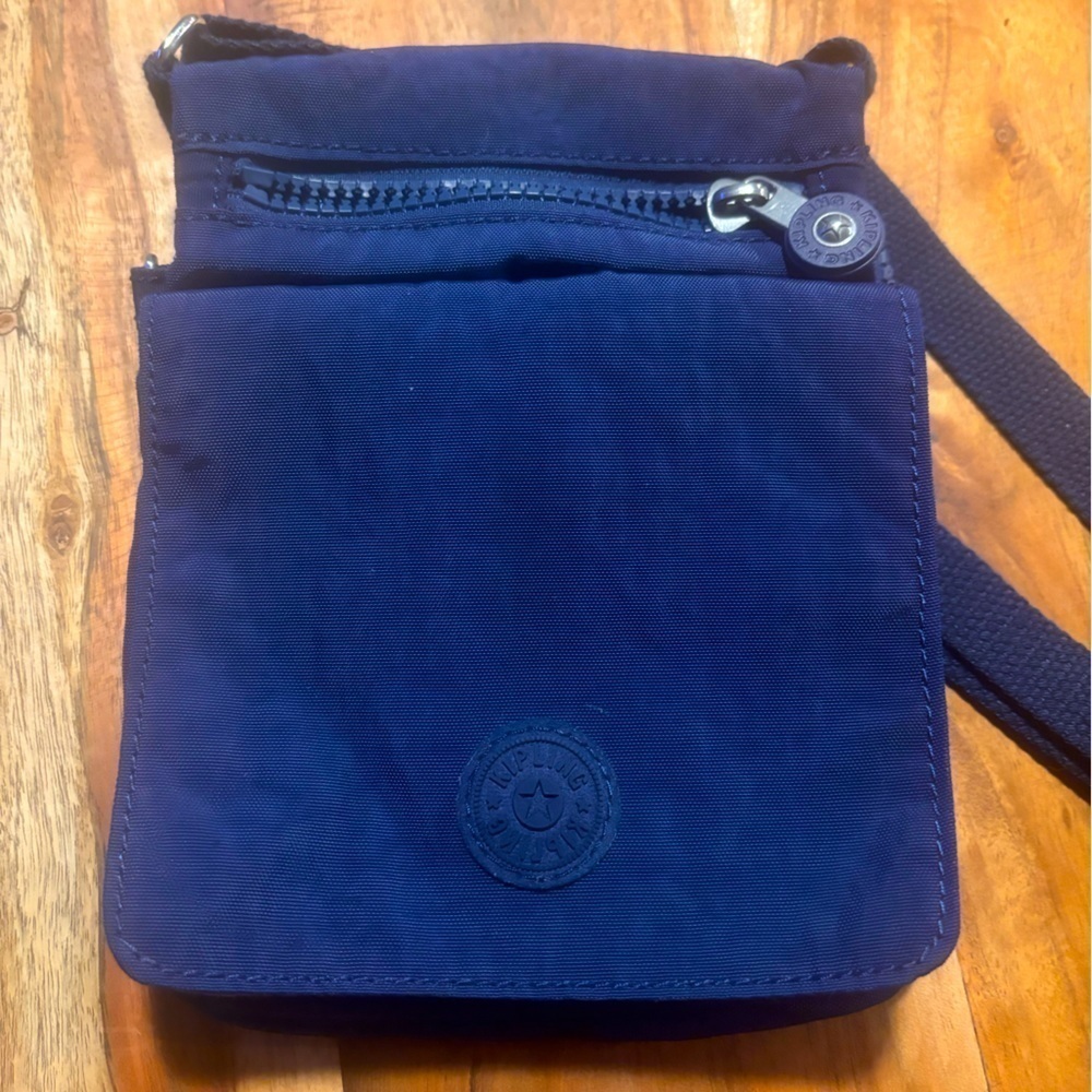Kipling Eldorado bag in Blue with grey lining. Excellent condition.